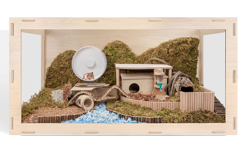 Niteangel hamster wheel on a raised platform in a natural-style wooden enclosure